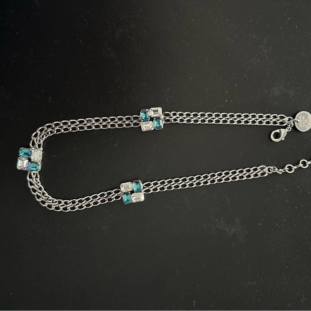 Silver and Blue Stone Bracelet with Intricate Design